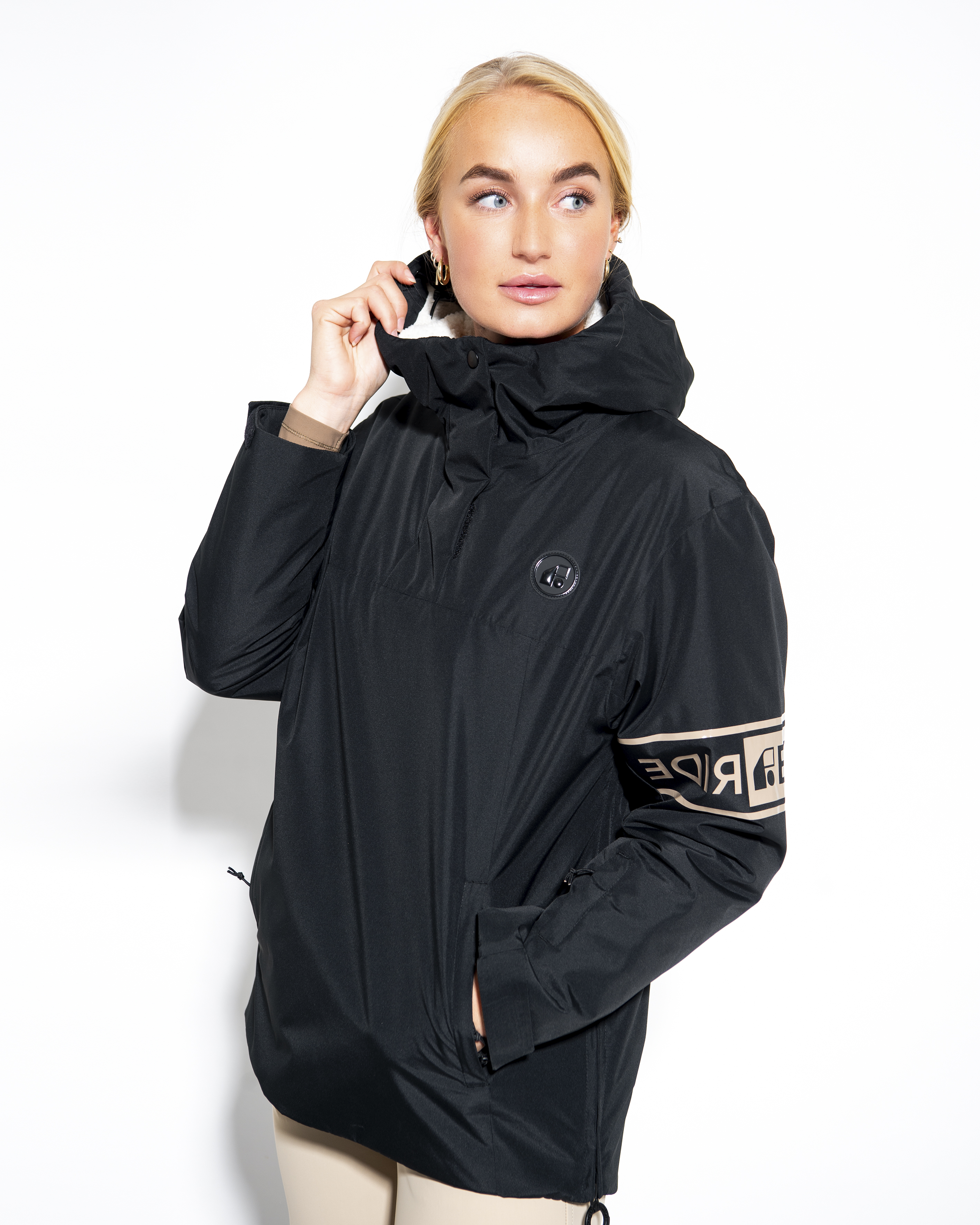 Lou black anorak, front view with collar and sleeve detail