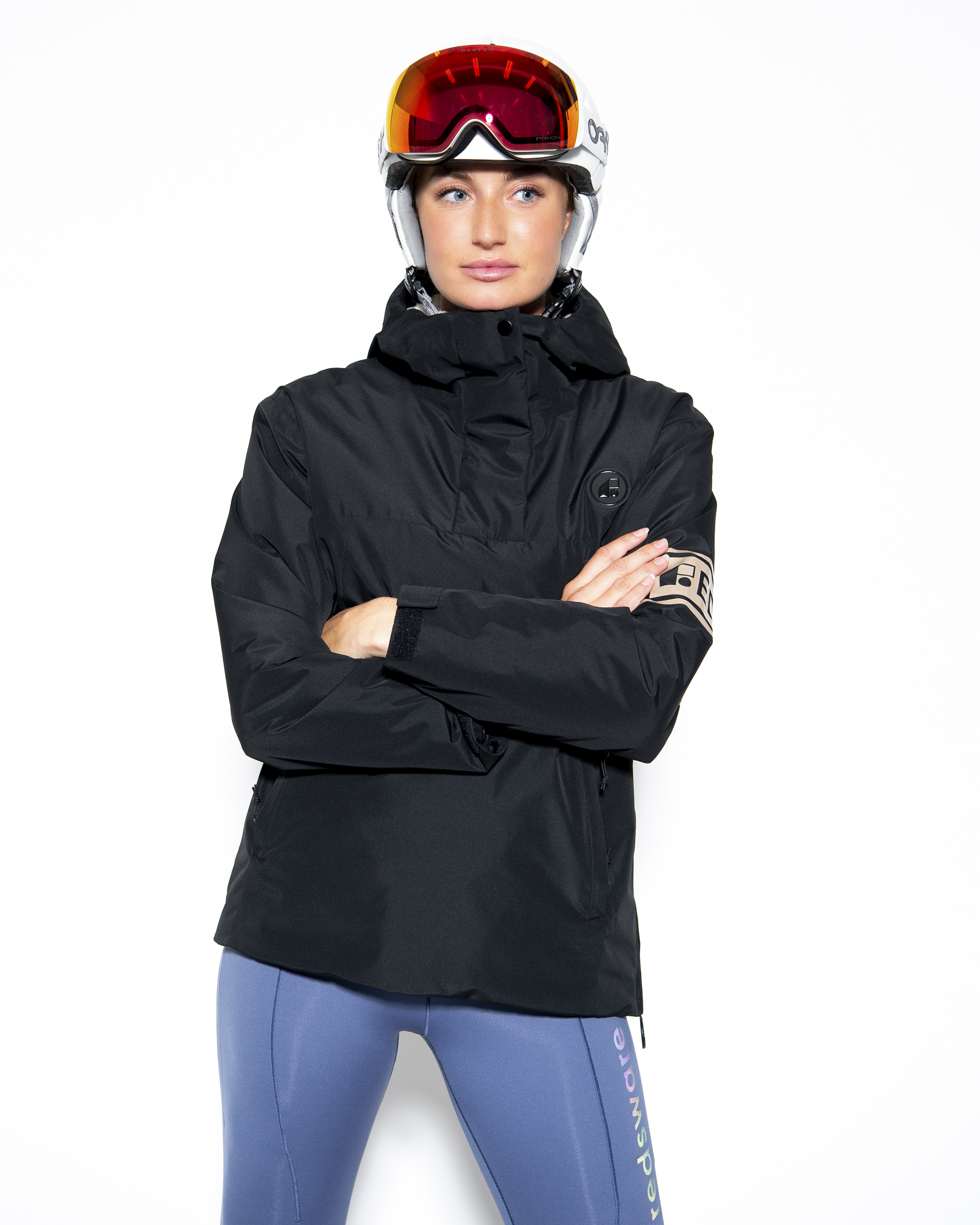 Lou black anorak, front view styled with helmet