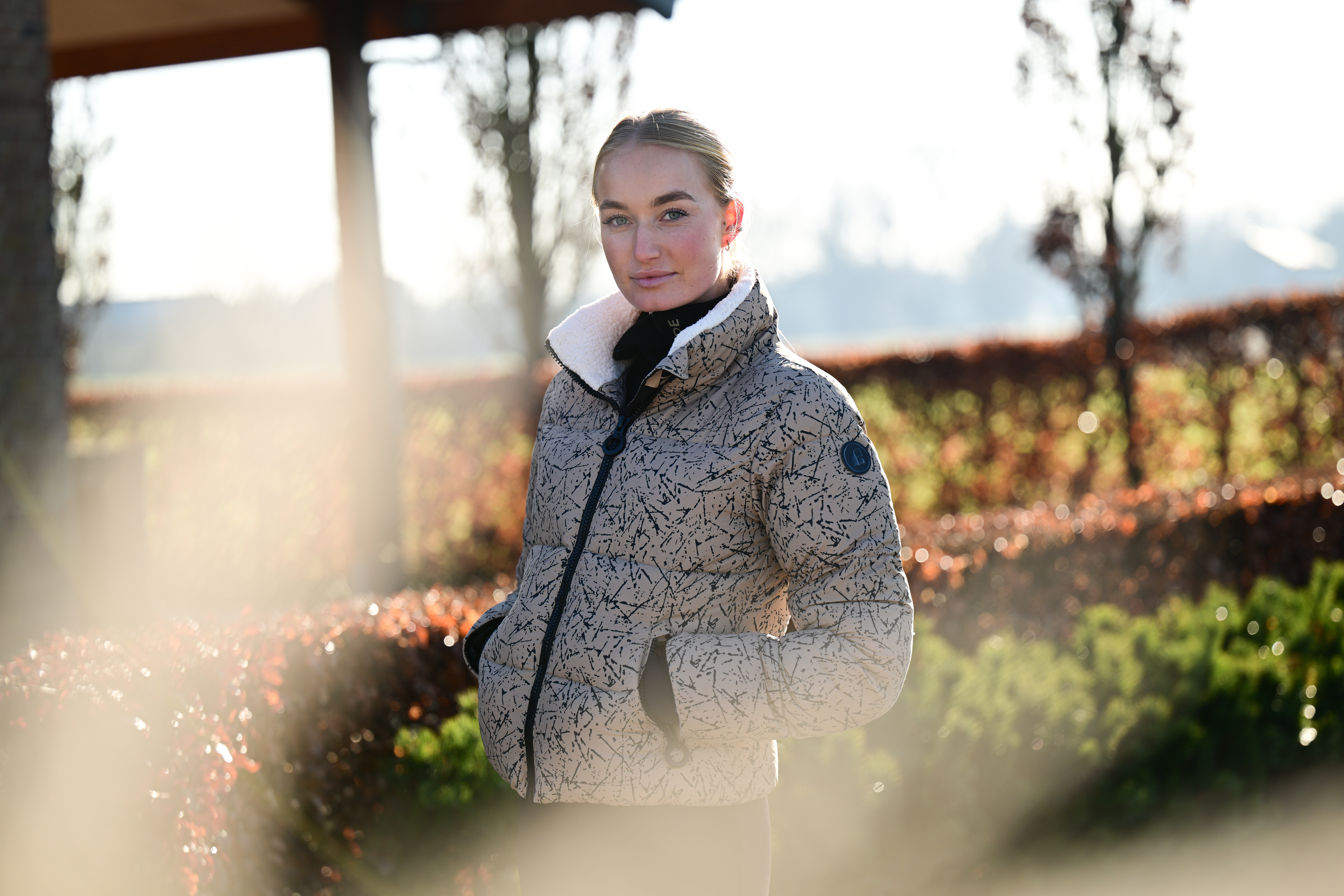 Suzy winter jacket in Mouse worn outdoors – three-quarter view